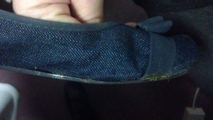 shoe patched with contact adhesive